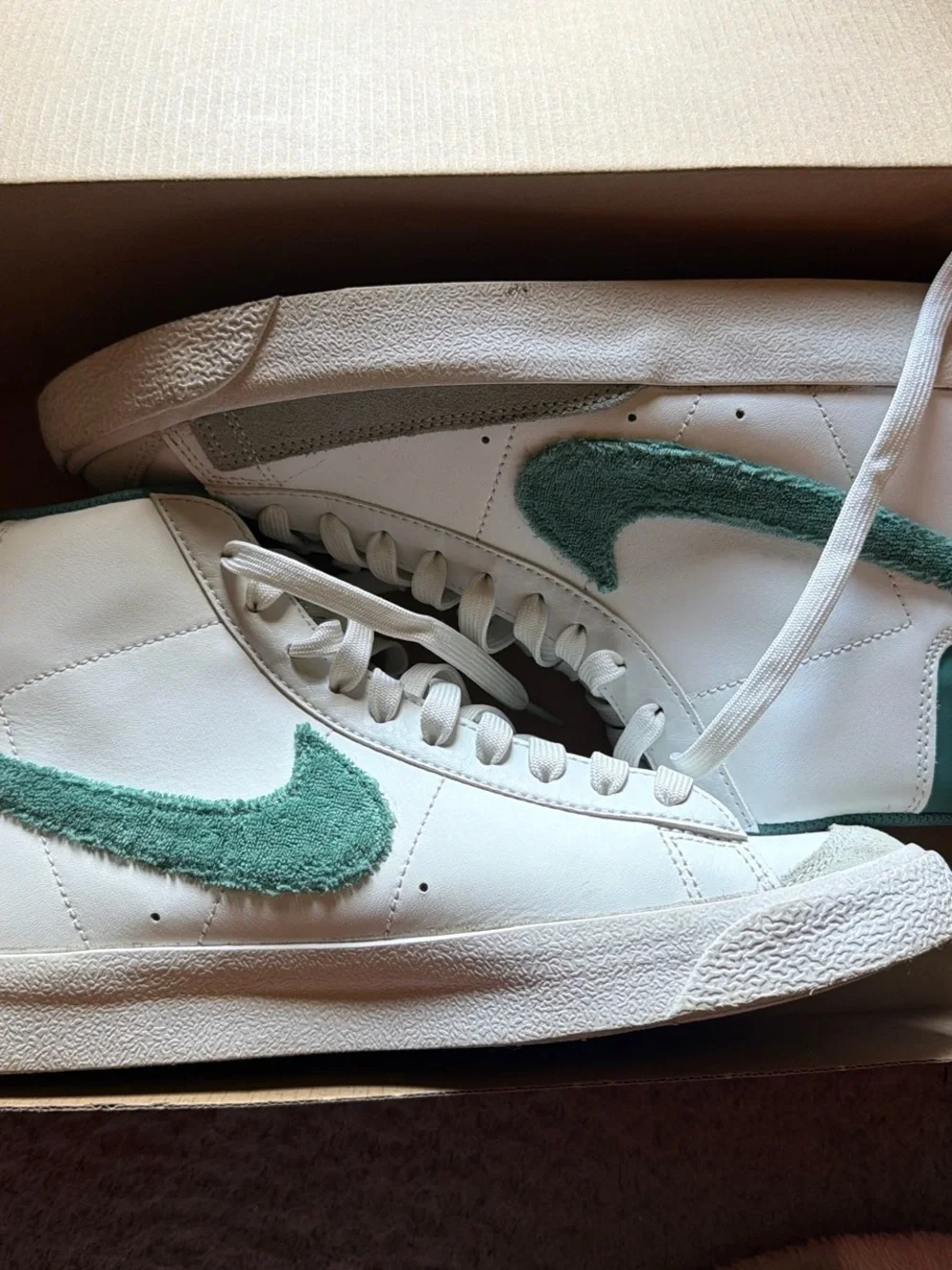 Nike White Low-Top Sneakers with Green Fuzzy Swoosh
